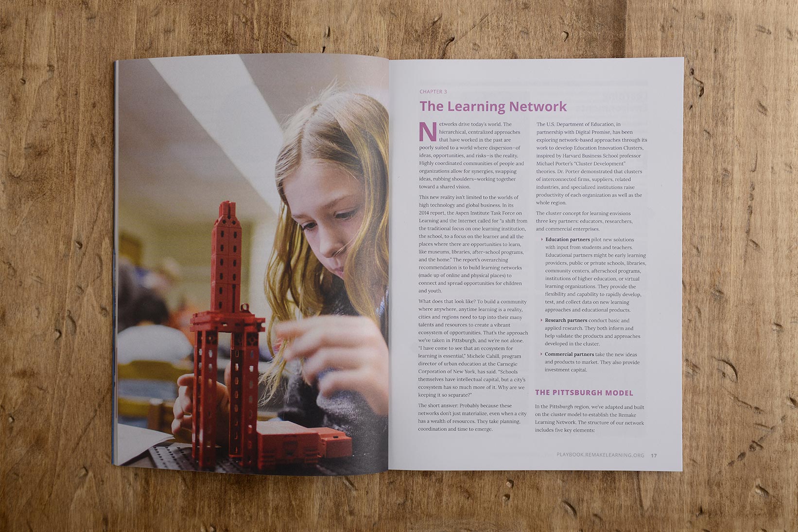 Remake Learning Playbook double-page spread featuring a girl building with block-like pieces