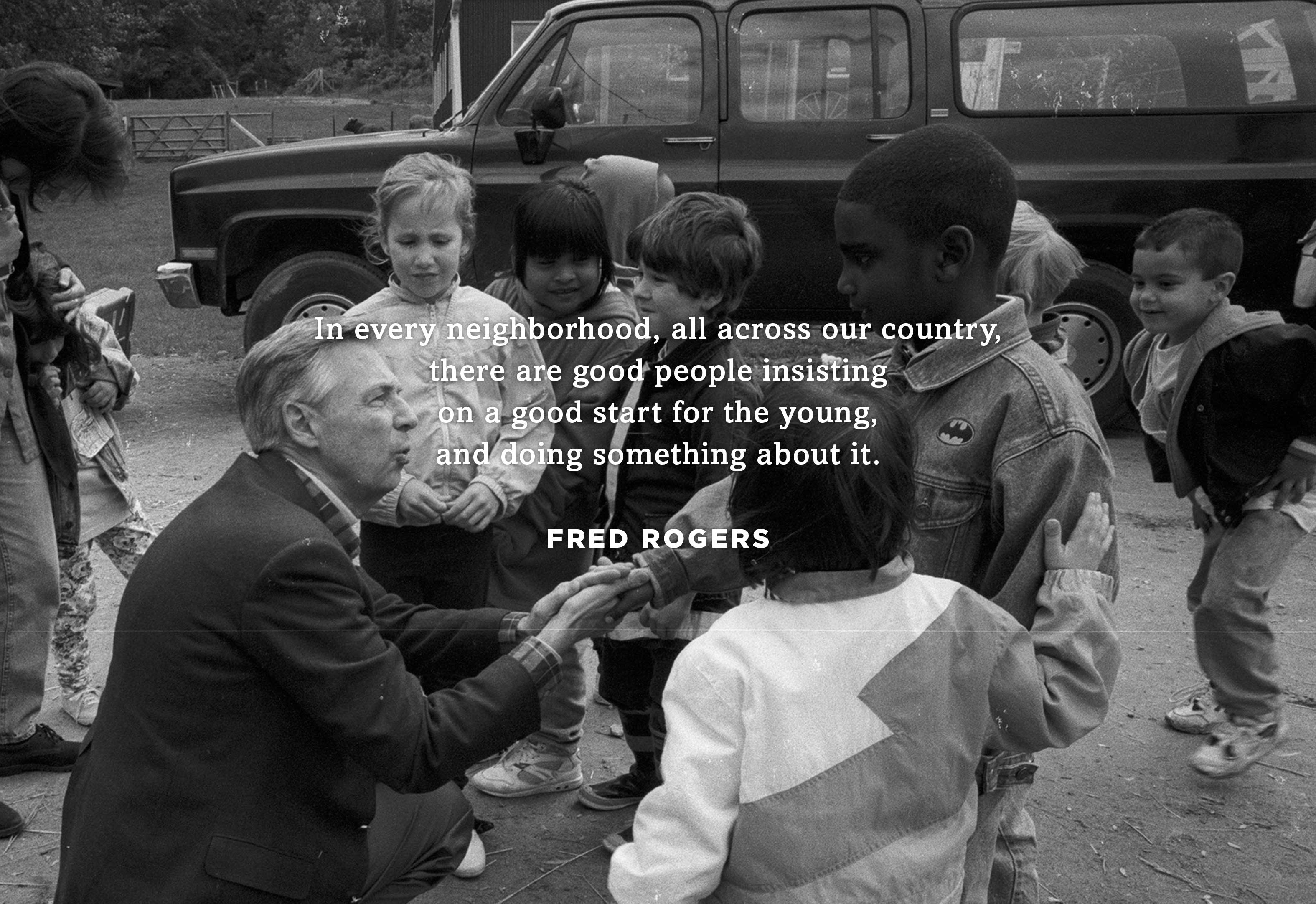 Fred Rogers speaking to a group a children. Photo by Lynn Johnson.