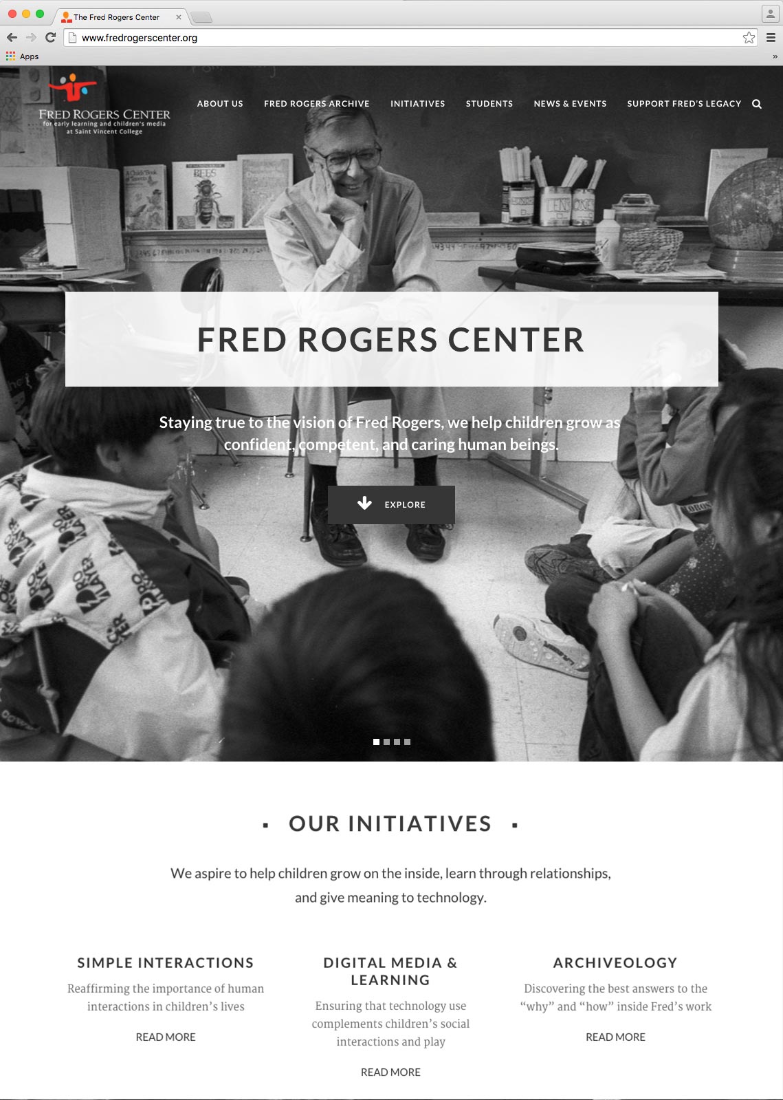 Fred Rogers Center home page with an image of Fred speaking with a classroom of kids.